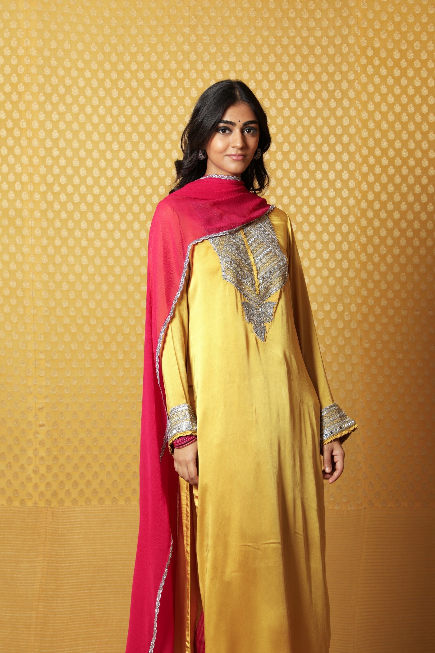 Mustard Hand-Embroidered Satin Kurta Paired With Pink Dupatta And Pink Pants