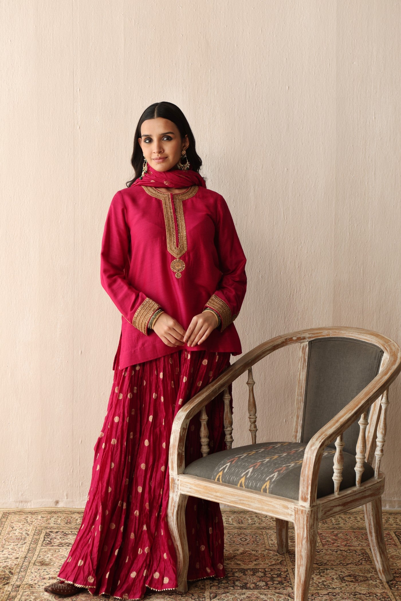 RANI-PINK HAND-EMBROIDERED PURE MUGA-SILK SHORT-KURTA WITH CRUSHED PURE SILK-COTTON (METALLIC POLKA DOTS) SHARARA SET