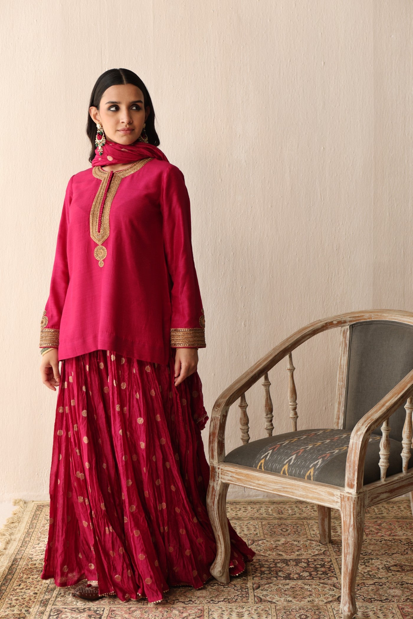 RANI-PINK HAND-EMBROIDERED PURE MUGA-SILK SHORT-KURTA WITH CRUSHED PURE SILK-COTTON (METALLIC POLKA DOTS) SHARARA SET