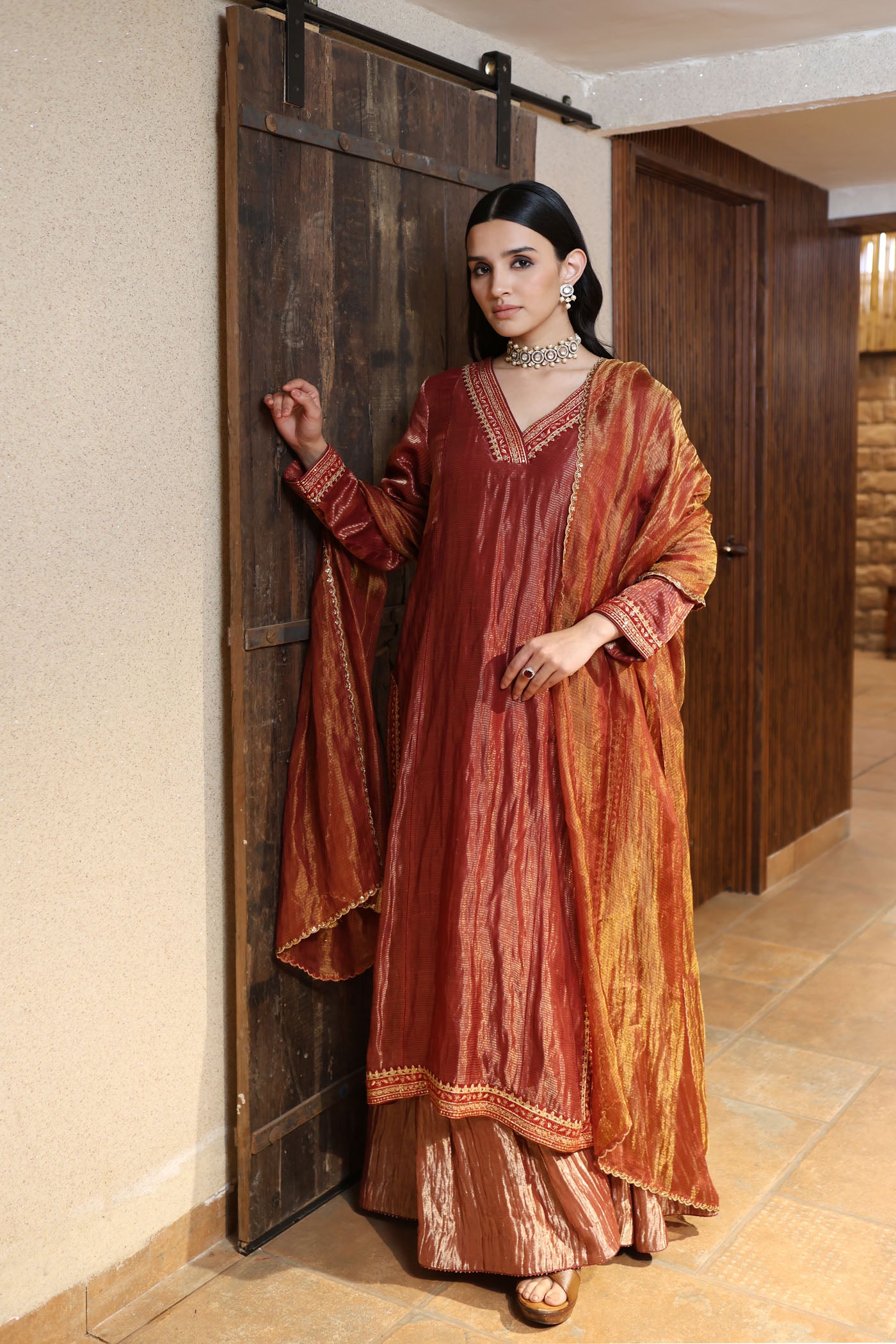 MAROON HAND-EMBROIDERED PURE SILK WITH METALLIC STRIPES KURTA PAIRED WITH PURE SILK TISSUE SHARARA & DUPATTA SET