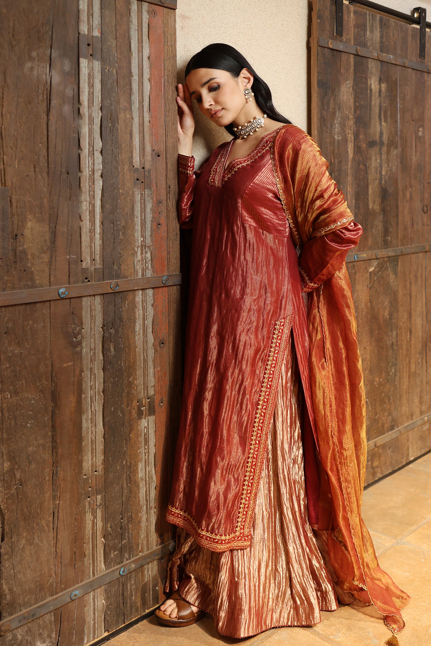 MAROON HAND-EMBROIDERED PURE SILK WITH METALLIC STRIPES KURTA PAIRED WITH PURE SILK TISSUE SHARARA & DUPATTA SET