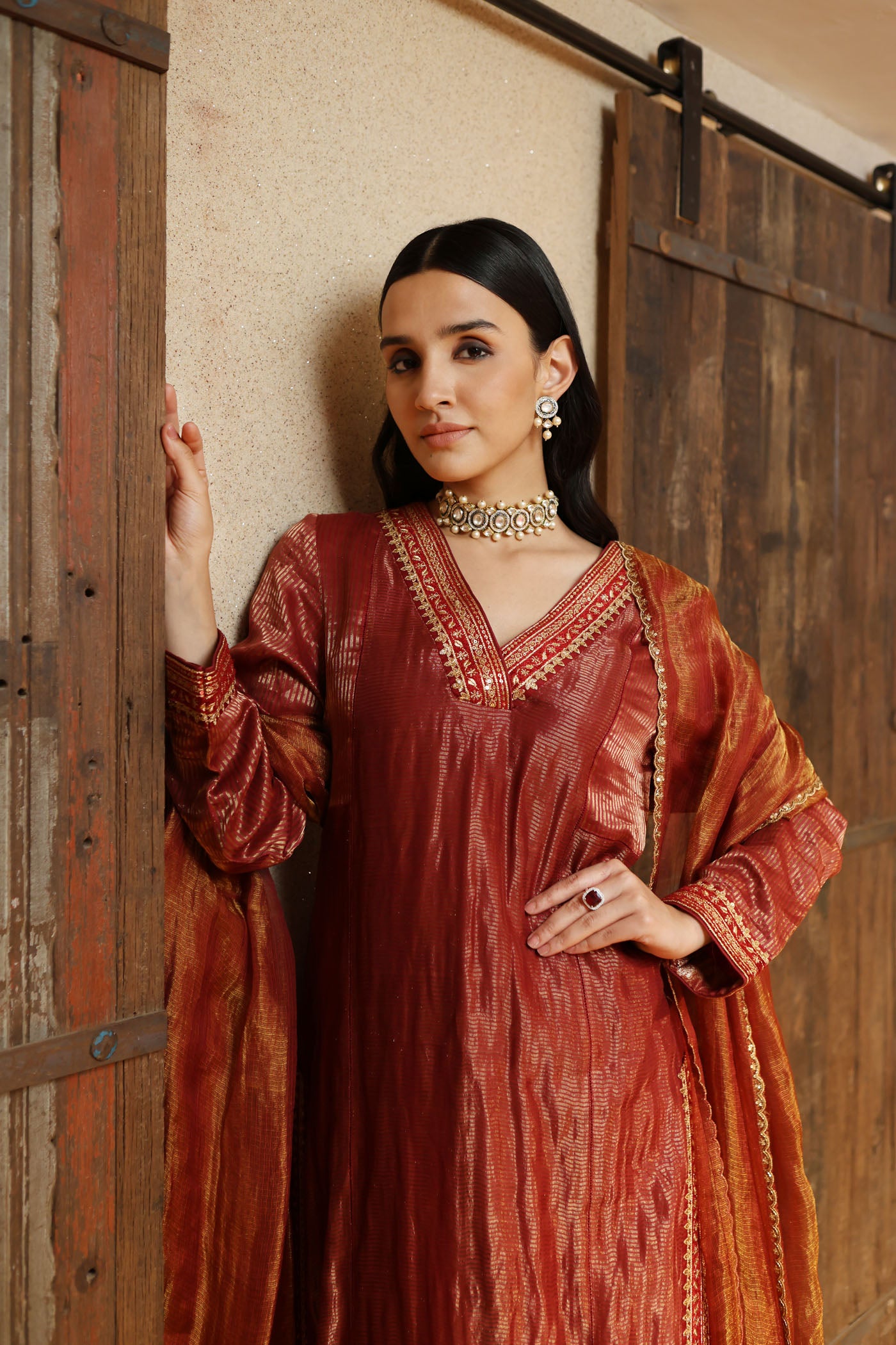 MAROON HAND-EMBROIDERED PURE SILK WITH METALLIC STRIPES KURTA PAIRED WITH PURE SILK TISSUE SHARARA & DUPATTA SET
