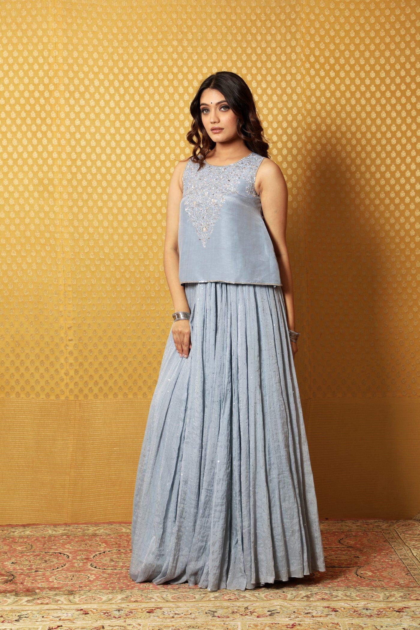 Hand-Embroidered Dusty-Blue Pure Silk- Linen Sleeveless Short Tunic Paired With Pure Silk-Cotton (Metallic) Skirt