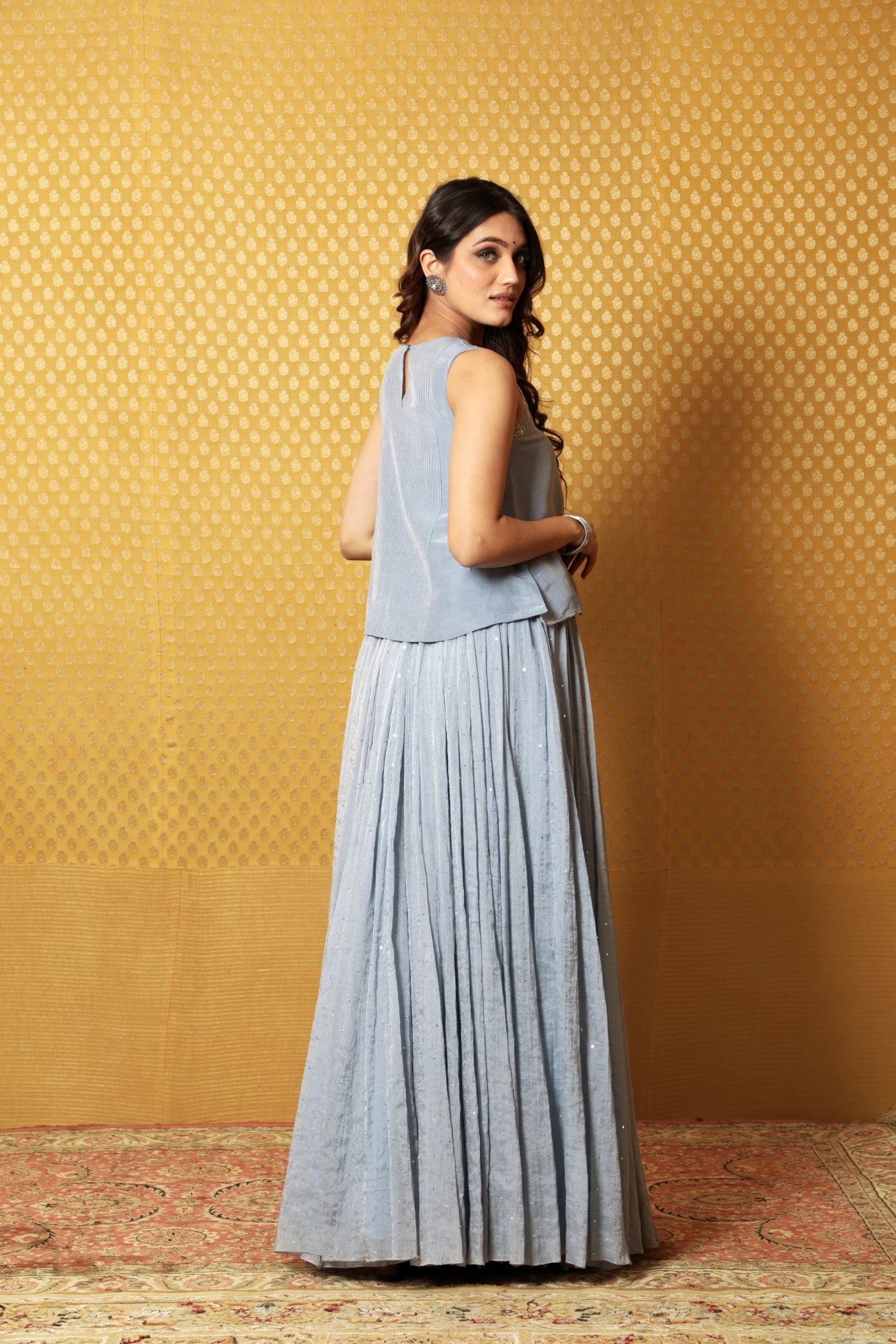 Hand-Embroidered Dusty-Blue Pure Silk- Linen Sleeveless Short Tunic Paired With Pure Silk-Cotton (Metallic) Skirt