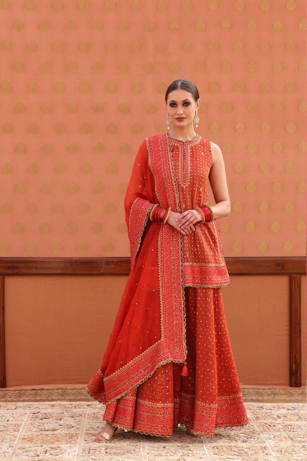 Women Orange Tie & Dye Coin Lace Tired Kurta With Sharara Pants main image 1