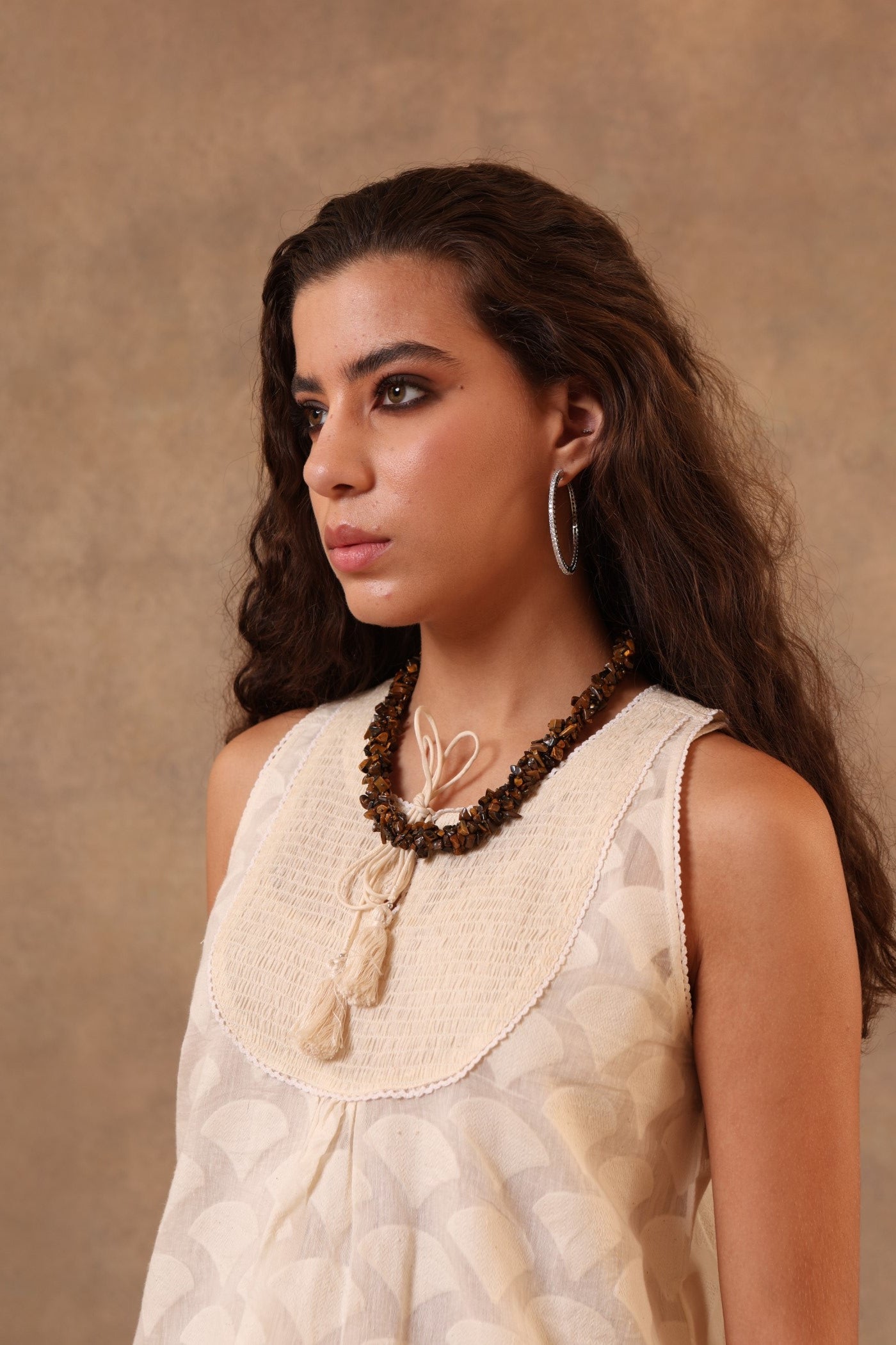 Off-White Pure Silk-Cotton (Cutwork) Short Blouse (Without Sleeves) With Smocking Detail & Hand-Made Tassels